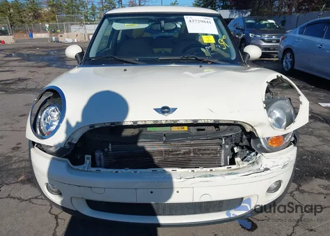 2010 Mini Cooper z USA, uszkodzony, nr VIN WMWMF3C56ATZ65306